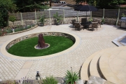 <h5>Water Feature Garden</h5><p>A plum slate monolith used as a center piece for this stunning garden </p>